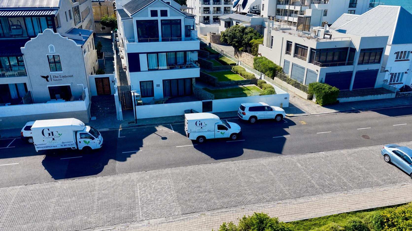 Gourmet Fresh delivery vehicles serving local businesses
